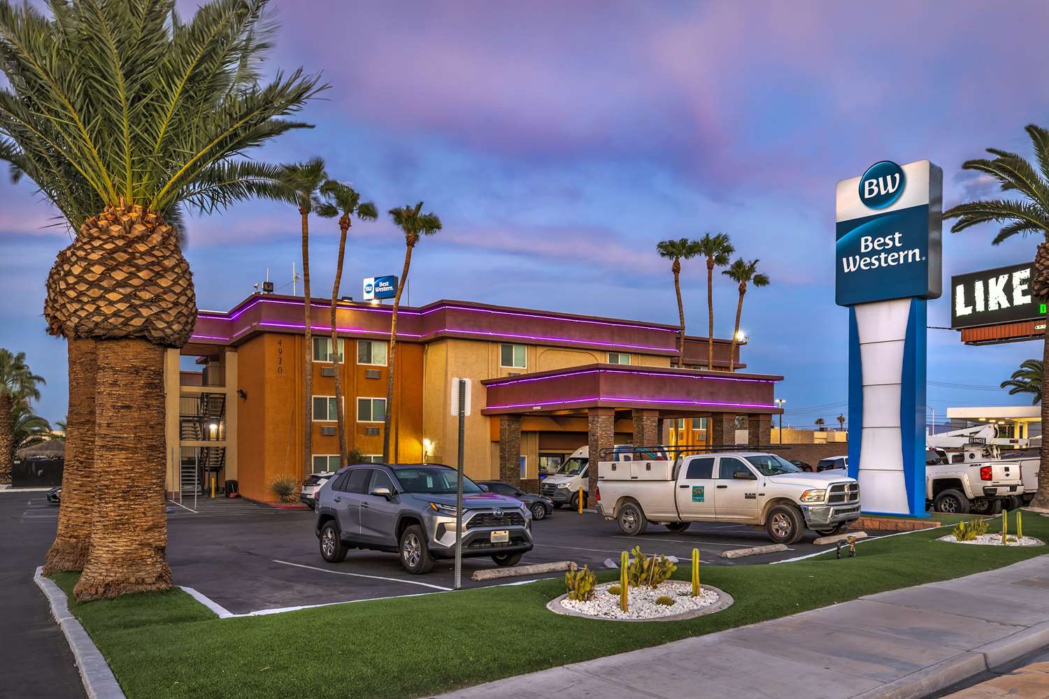 Best Western McCarran Inn exterior at dusk