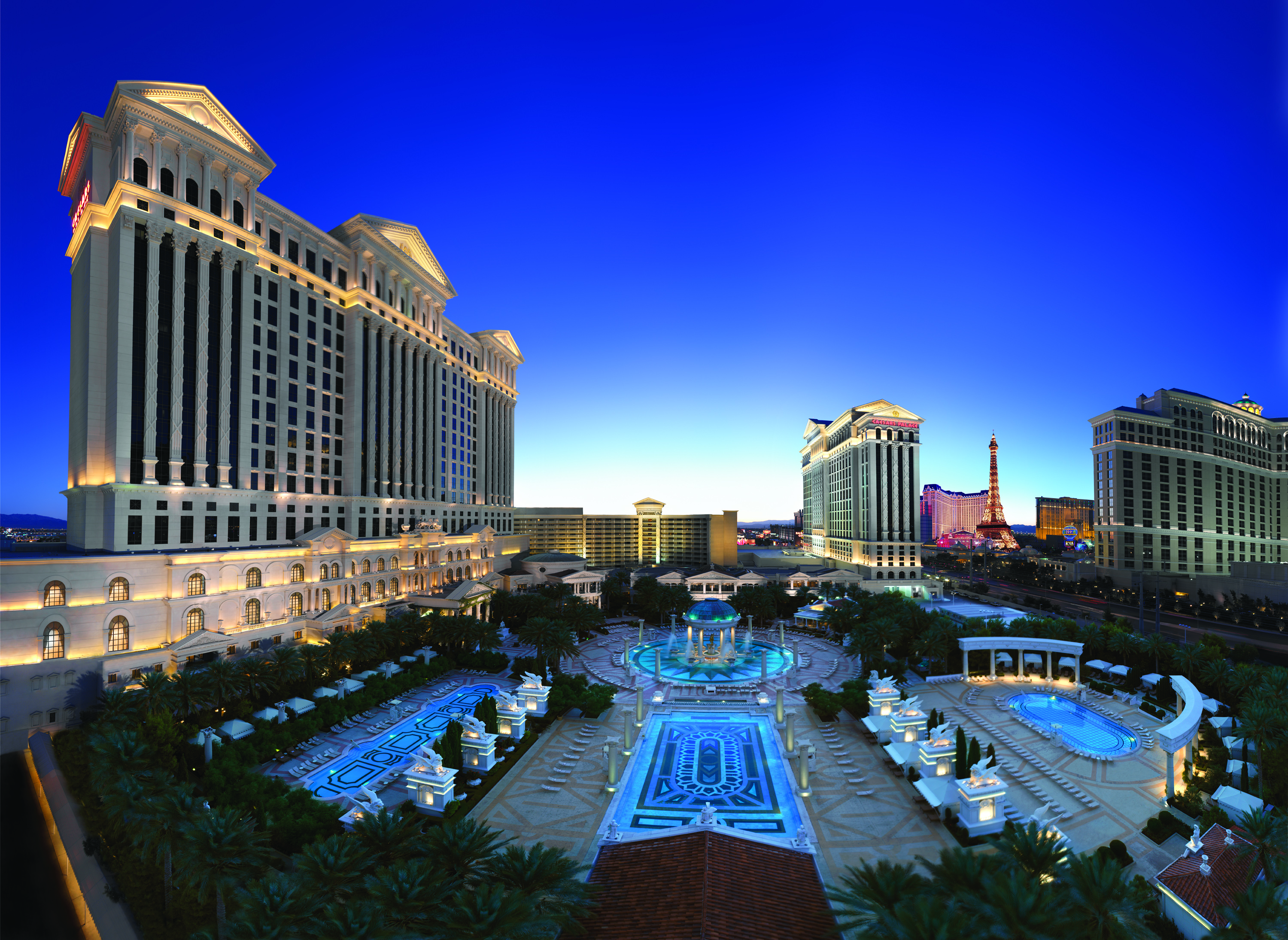 Caesars Palace resort and Garden of the Gods Pool Oasis at dusk