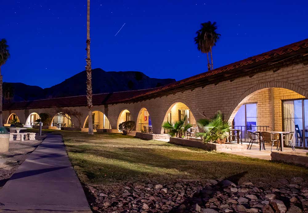 Cottonwood Cove Motel exterior at night