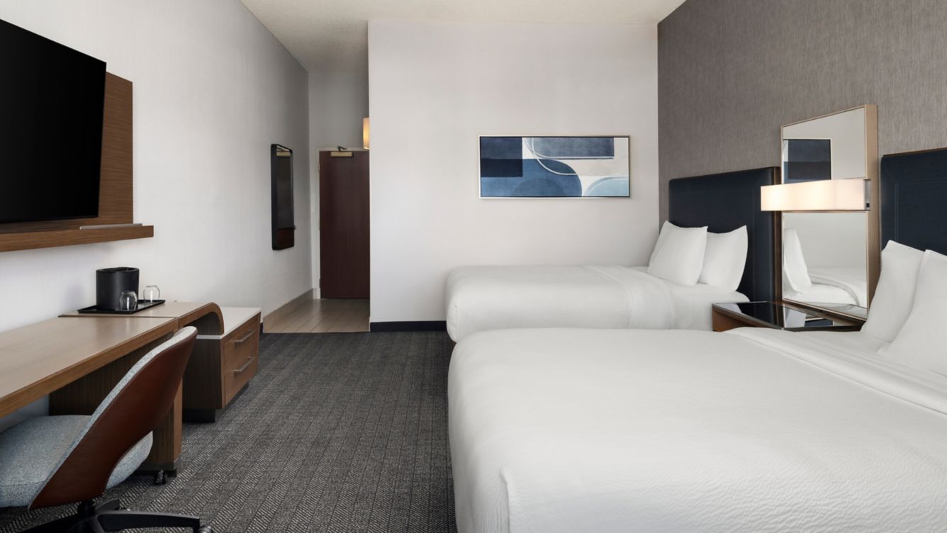 Double/Double Guest Room with desk and TV - Courtyard by Marriott Las Vegas Henderson/Green Valley Guest Rooms Double/Double Guest Room