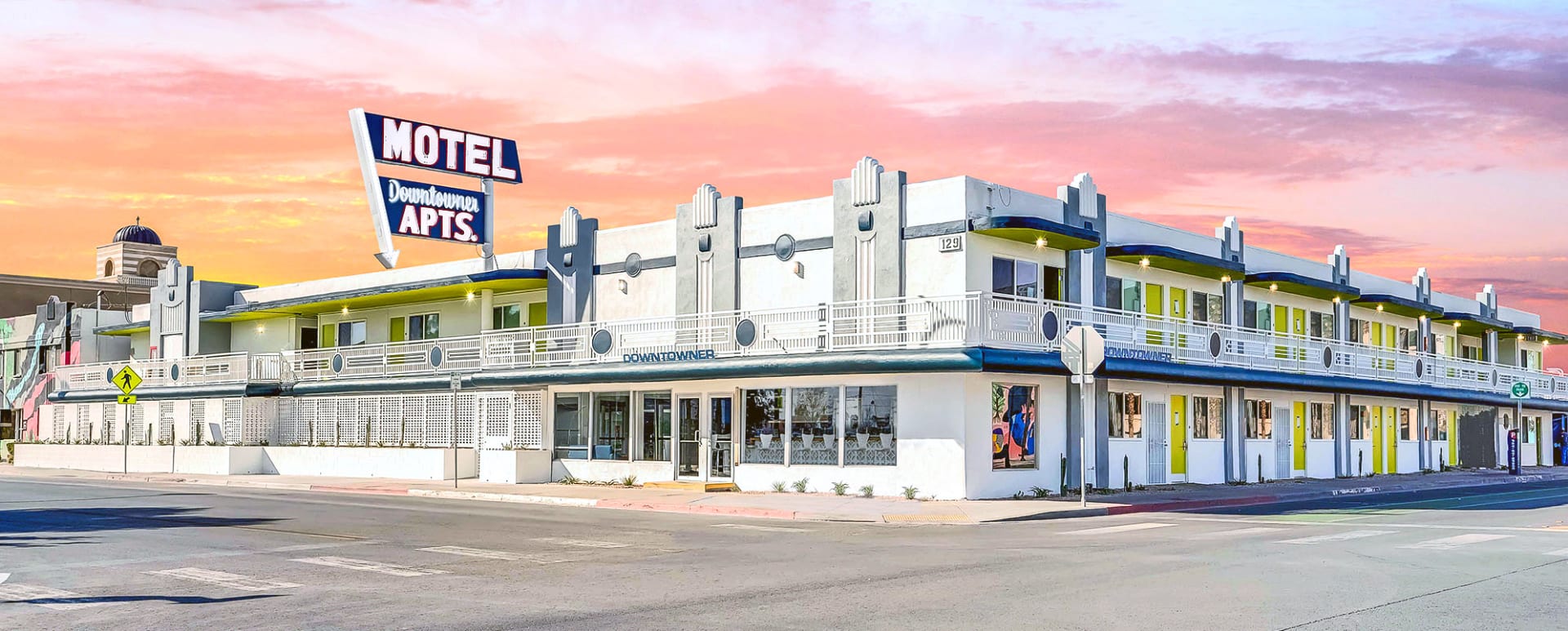 Downtowner Boutique Hotel exterior at sunset