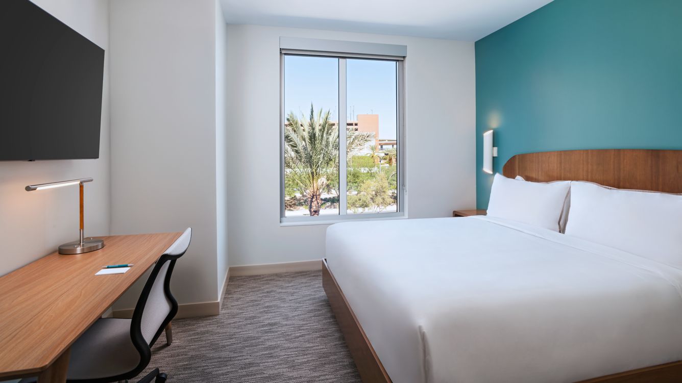 King Bed, desk, window, natural light - Element by Marriott Las Vegas Symphony Park Guest Rooms King Bedroom