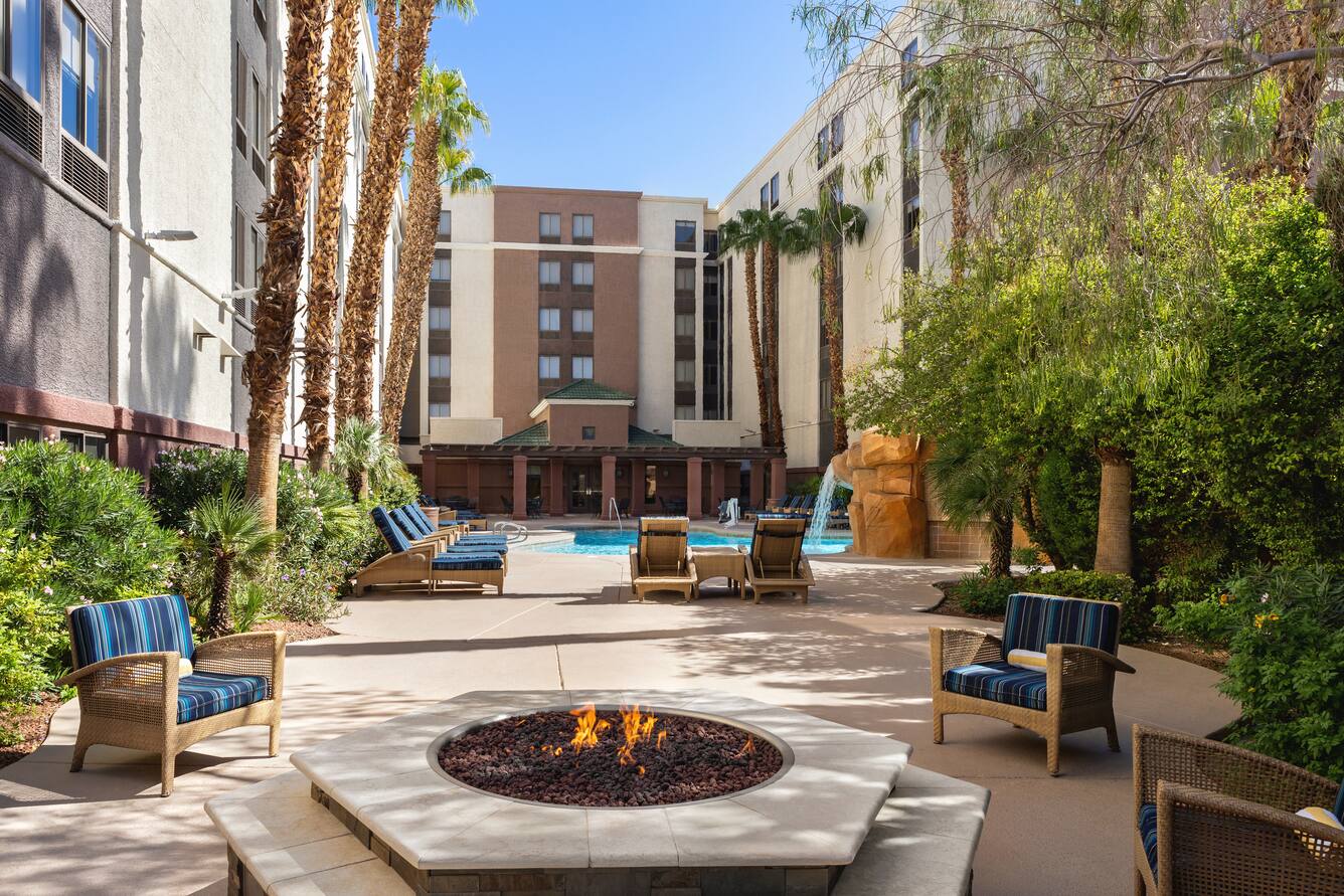 Hampton Inn Tropicana pool courtyard and firepit