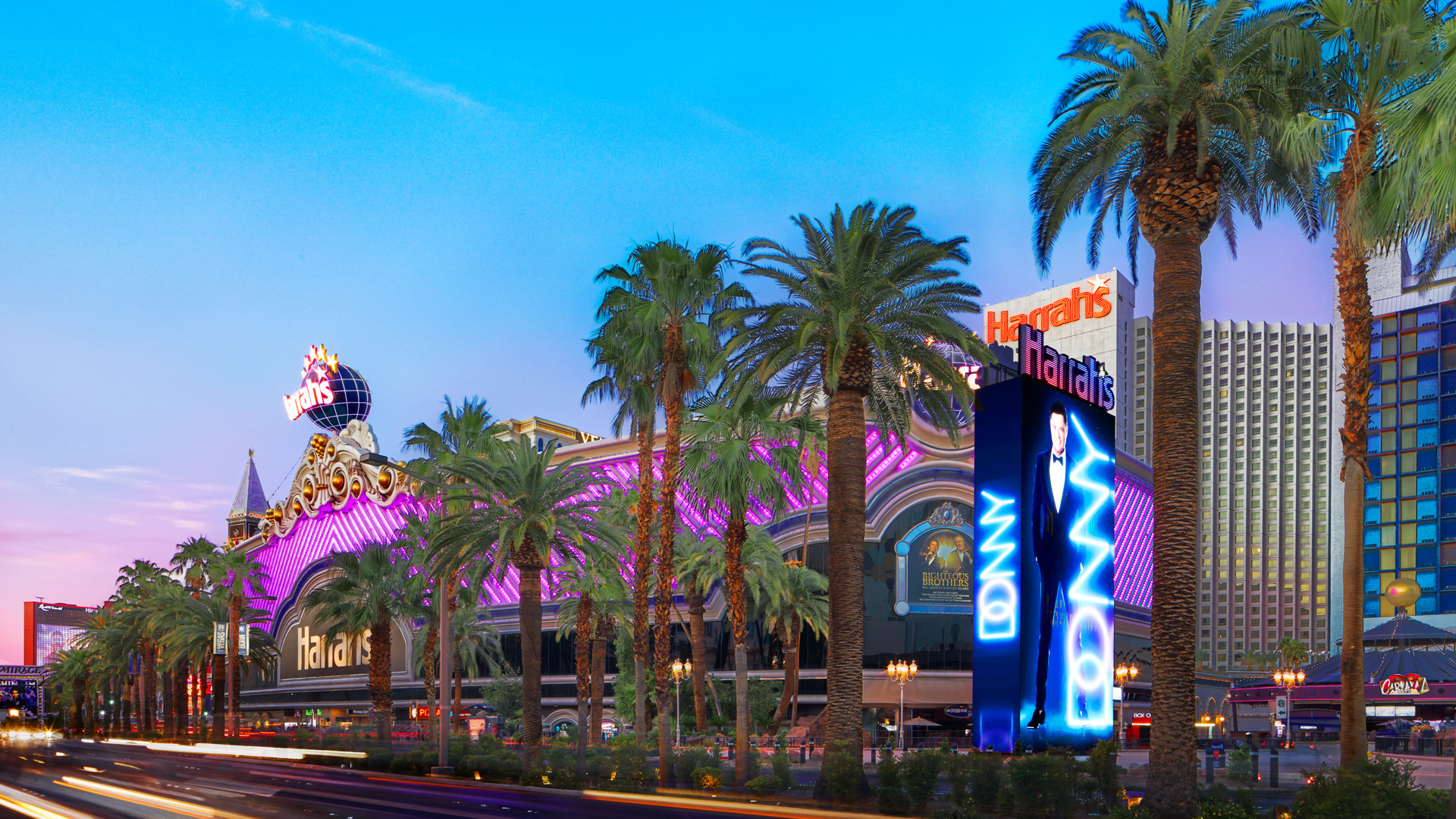 Harrah's Las Vegas hotel and casino exterior at dusk