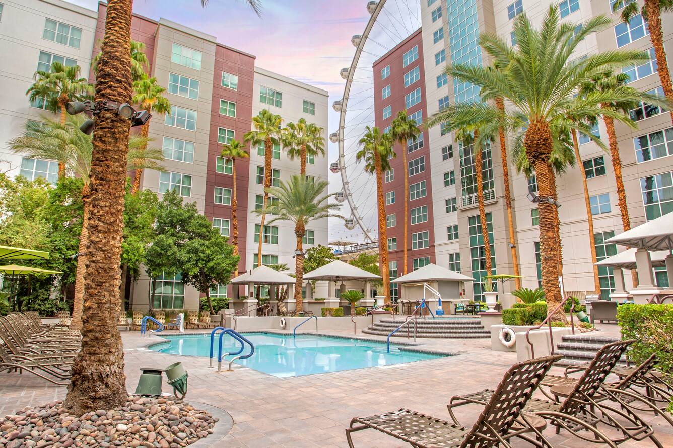 Hilton Grand Vacations Club at the Flamingo pool courtyard and hotel exterior