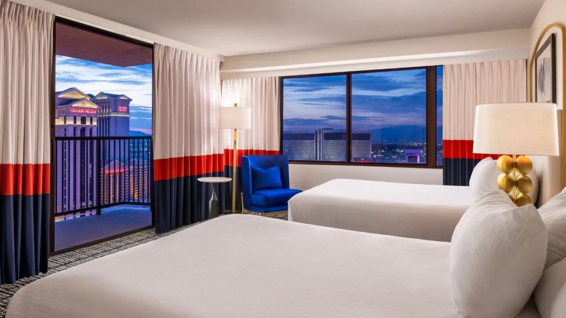 Paris Las Vegas Versailles Tower balcony room with two queen beds and Strip views