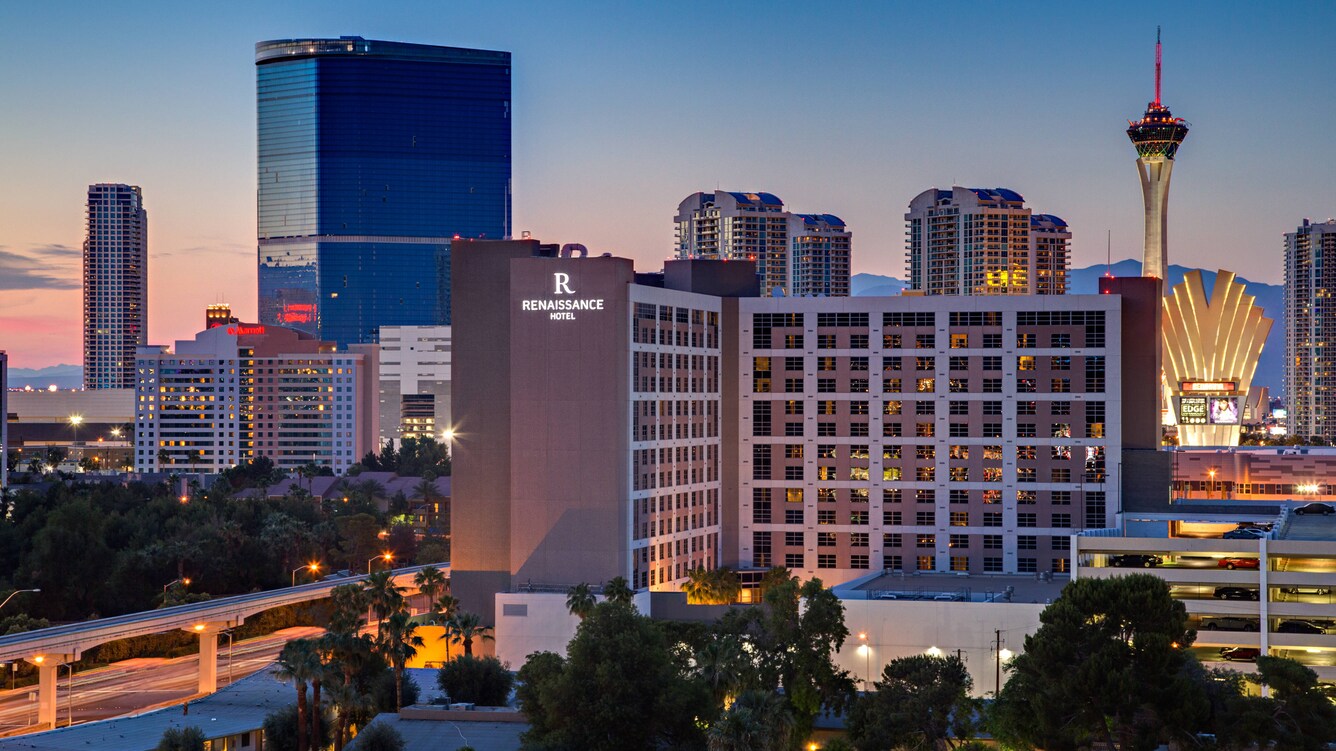 Renaissance Las Vegas Hotel exterior and surrounding skyline at dusk