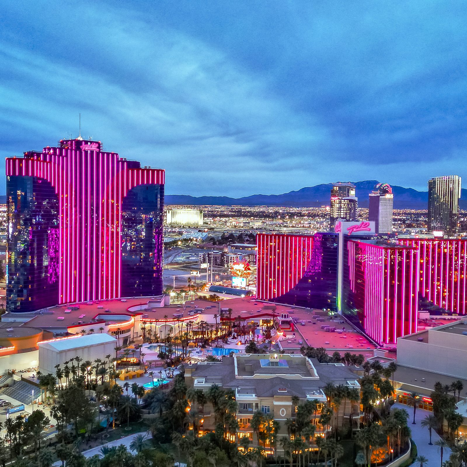 Rio Hotel & Casino towers illuminated at dusk