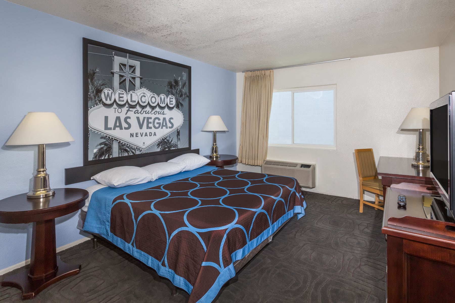 Guest room at the Super 8 by Wyndham Las Vegas North Strip/Fremont St. Area in Las Vegas, Nevada