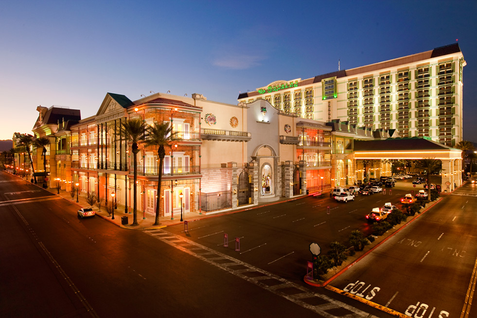The Orleans Hotel and Casino exterior at dusk