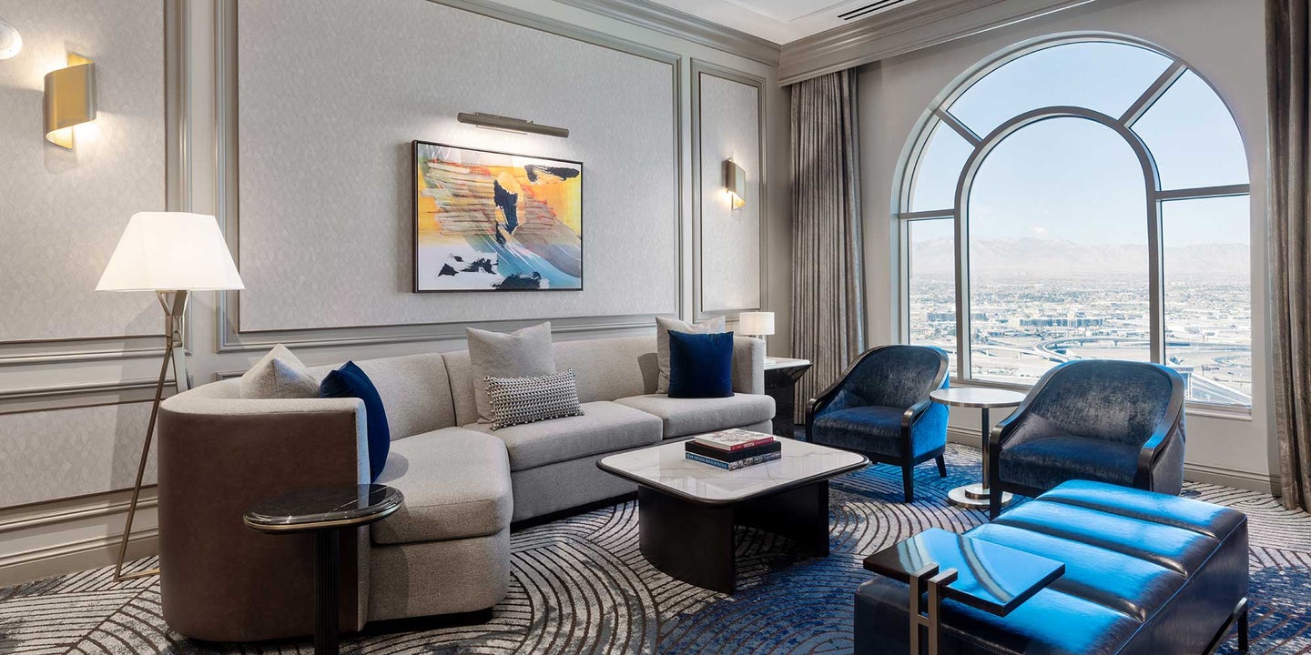 The Venetian Grand One Bedroom Suite living room with arched window